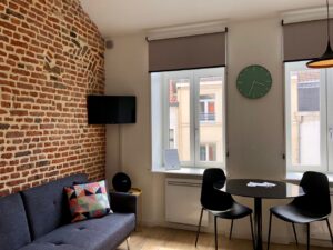 Le Chat qui dort Lille appartement La Déesse salon et coin repas